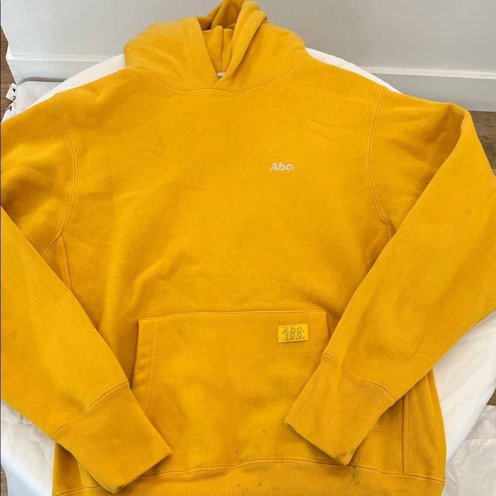 Advisory Board Crystals mustard yellow hoodie